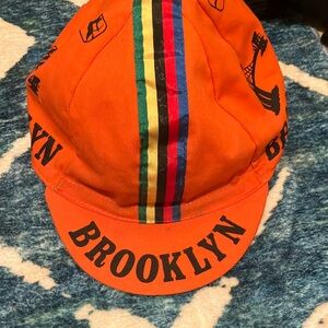 Orange and Black Cycling Cap with Stripe Pattern
